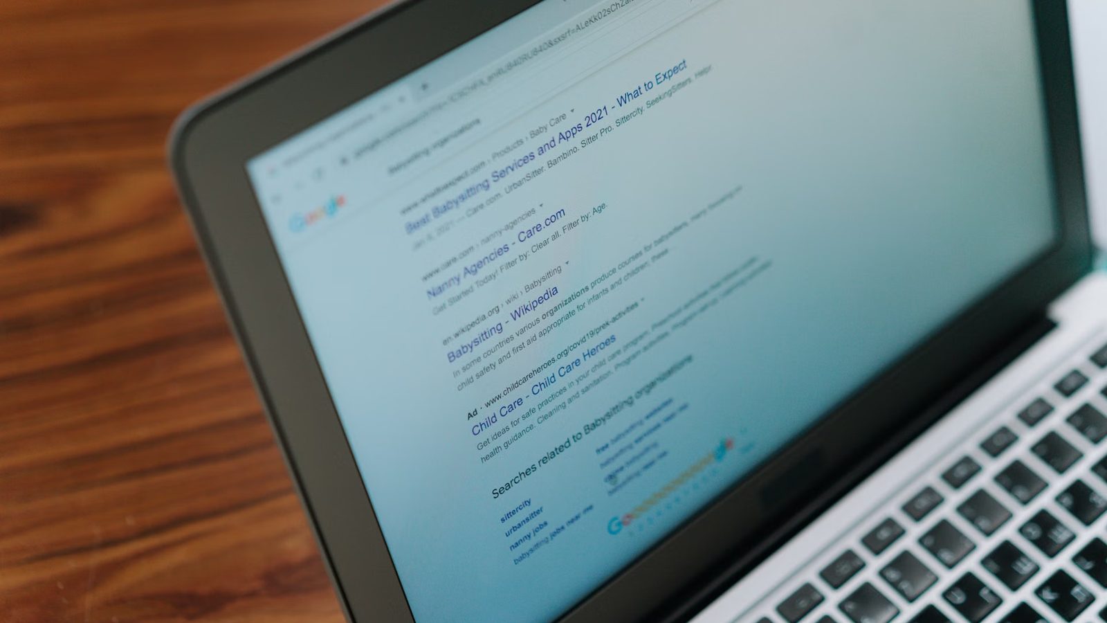 Search results with ads on a laptop screen