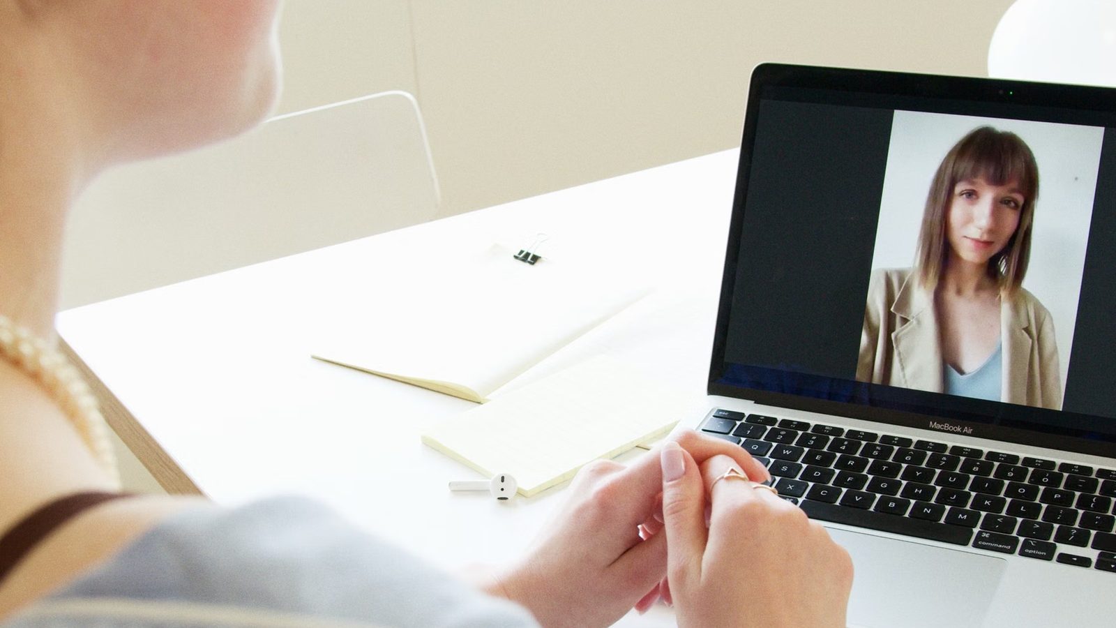 Video call on a laptop with headphones
