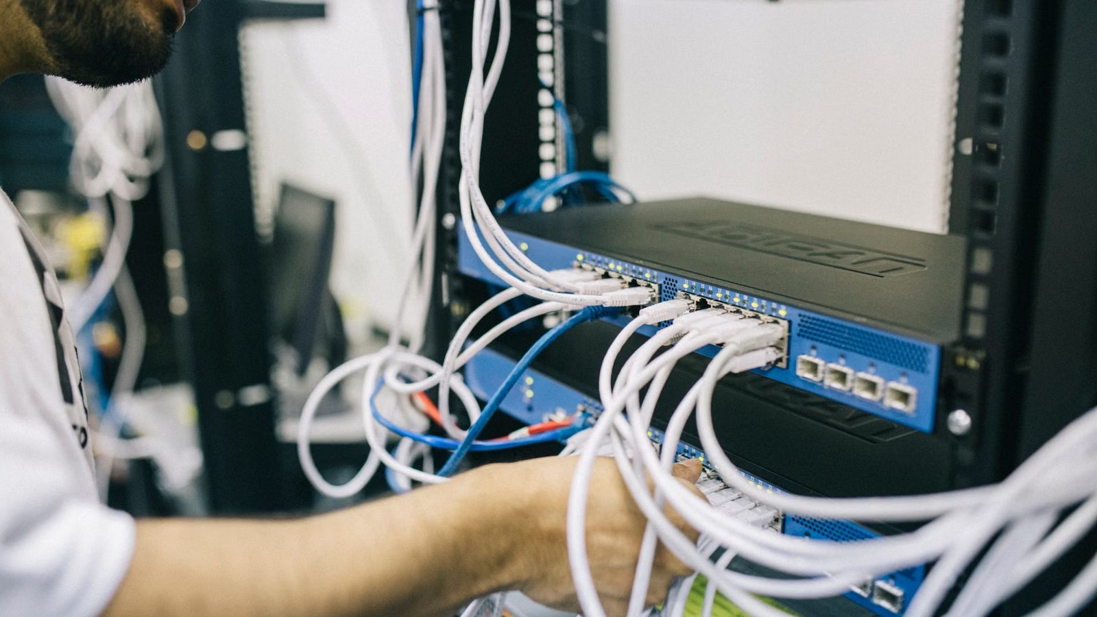 IT technician working on hardware in an office