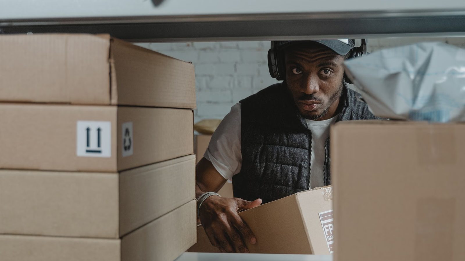 Packing orders into a box in the warehouse